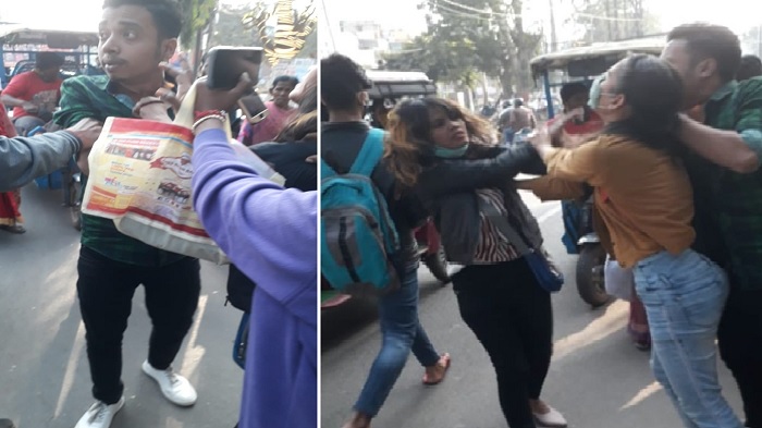 पटना के बोरिंग रोड में बीच सड़क पर युवती ने युवक को पीटा, देती रही भद्दी-भद्दी गालियां
